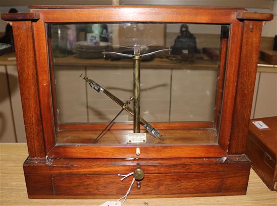 A set of mahogany cased chemists scales